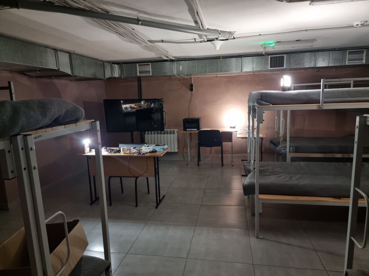 A mix of BRIGHT's Move and Sol High Capacity solar lamps illuminate a transit centre facility in Kharkiv.