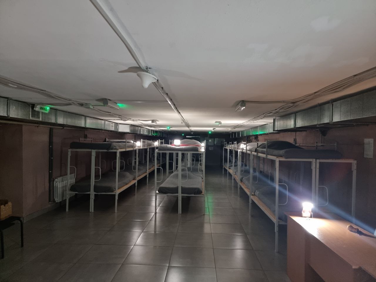 BRIGHT's Move and Sol High Capacity solar lamps illuminate one of the rooms at a transit centre in Kharkiv.