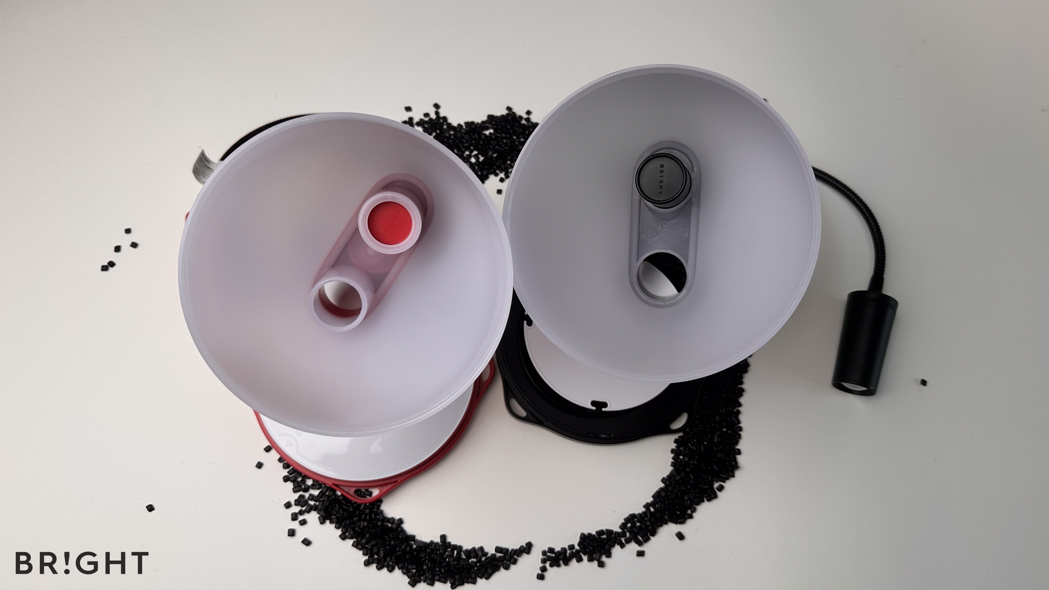 Image shows the difference in plastic use realised from design optimastions to the SunBell solar lamp which resulted in up to 19% reduction in plastic use.