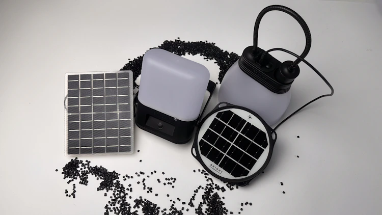 Image of the upgraded SunBell 2.0Y solar panel made with 100% post-consumer recycled (PCR) plastic and the Sol solar lamp with the new, lighter and more efficient monocrystalline solar panel using Ethylene Tetrafluoroethylene (ETFE) plastic. Two latest innovations showcasing BRIGHT's approach to using circular product design to tackkle plastic pollution